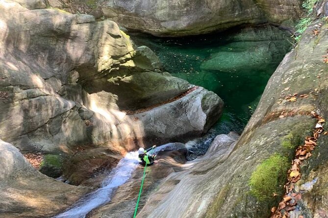 Basic Corippo Canyoning Experience in Valle Verzasca - Slides, jumps, and rope descents through the canyon