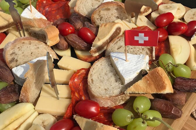 Cheese platter by Boat on Lake Thun, Interlaken - A small boat and a personal captain