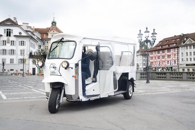 City Tour Plus Lucerne by Etuktuk - Old Town, narrow streets, and the city beyond postcards