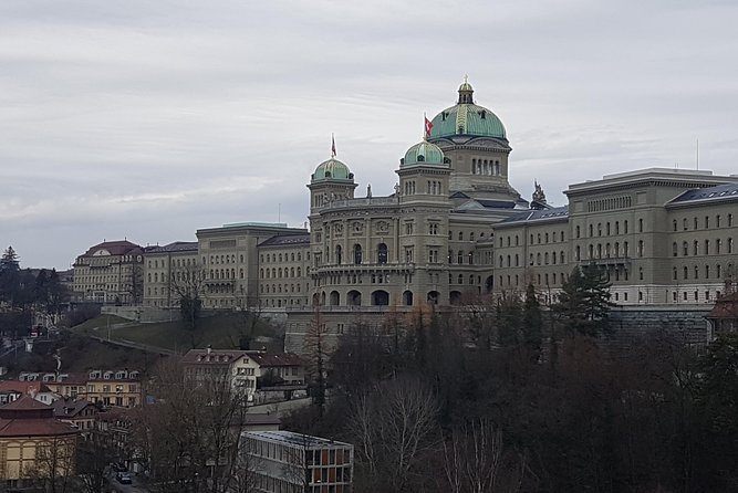 Exploring Bern City: Swiss Capital Private Walking Half-Day Tour - Rathaus, Zytglogge, and the old town arcades