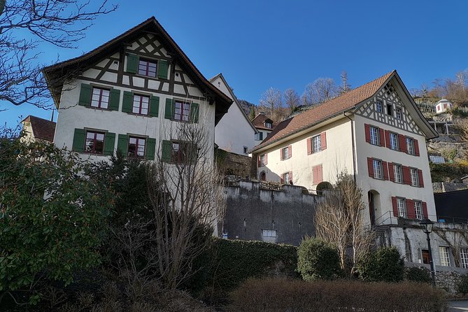 From Zurich: Breathtaking waterfall and lakes private tour - A green-blue mountain lake above Glarus