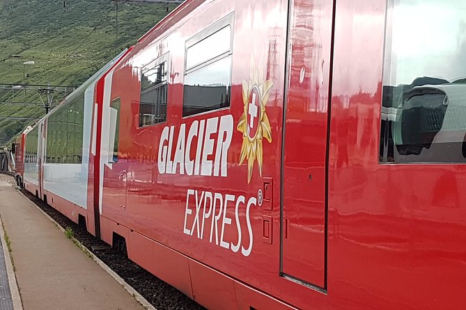 Glacier Express Panoramic Train Round Trip from Zürich With Private Guide - Andermatt offers another brief look at mountain life