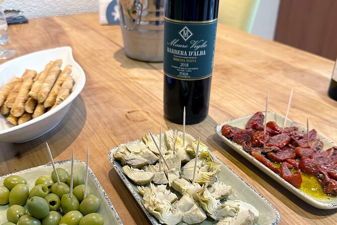 Homemade Italian Lasagna Experience with a Local Family - Starting with olives, artichokes, and focaccia