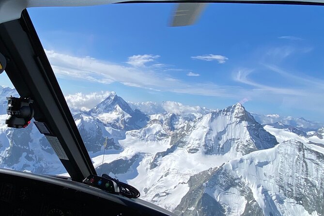 Matterhorn helicopter tour - longest scenic flight from Bern over the Swiss Alps - Oeschinensee and the color of alpine water