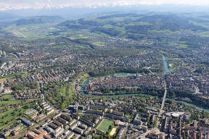 Swiss Capital city helicopter sightseeing tour - the ideal flight to see Berne - Wankdorf Stadium and Bern’s modern side