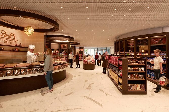 Tour in Lindt Home of Chocolate Museum From Zurich With pickup - Unlimited tastings at the chocolate room