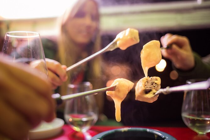 Zurich eTukTuk Private Tour - with Cheese Fondue and Wine - Predigerplatz and the Rathaus